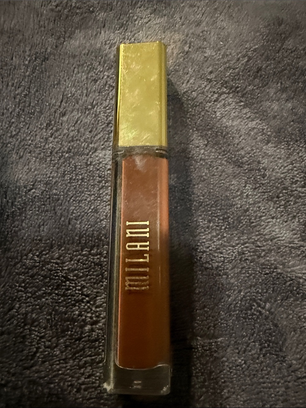 Milani Liquid lipstick in Rich Brown with Gold Cap shade covet